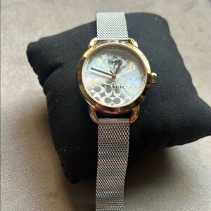 Coach Silver Women's Watch used but in very good condition needs new battery